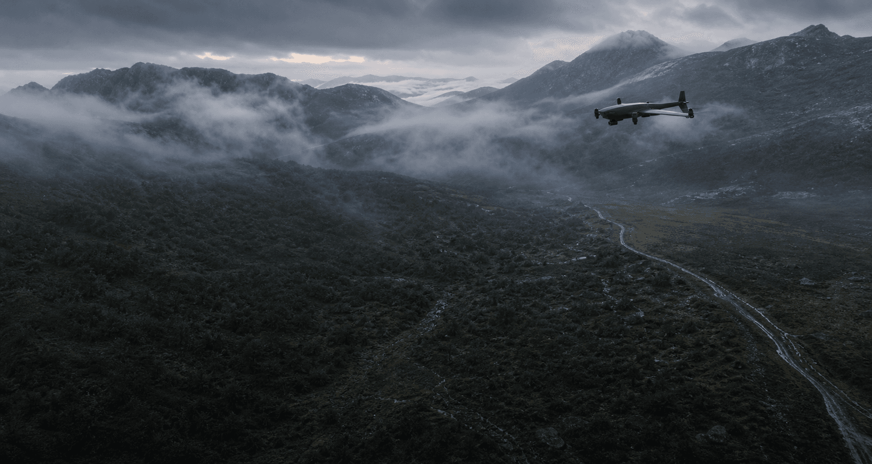 FIELDGLASS drone repeating a search sweep over a misty mountain corridor